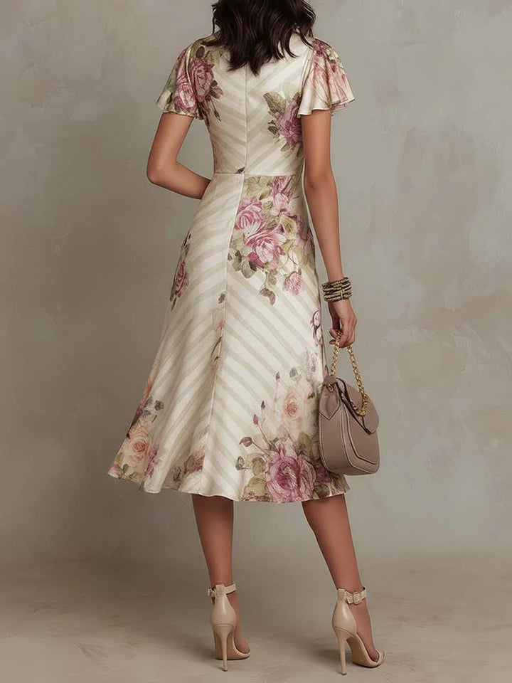 Alba - Elegante retro midi jurk in satijn met bloemenprint