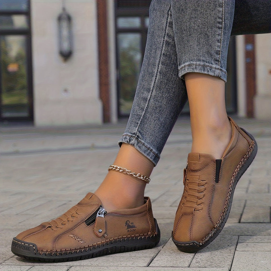 Nila – Elegante comfort met een praktische rits
