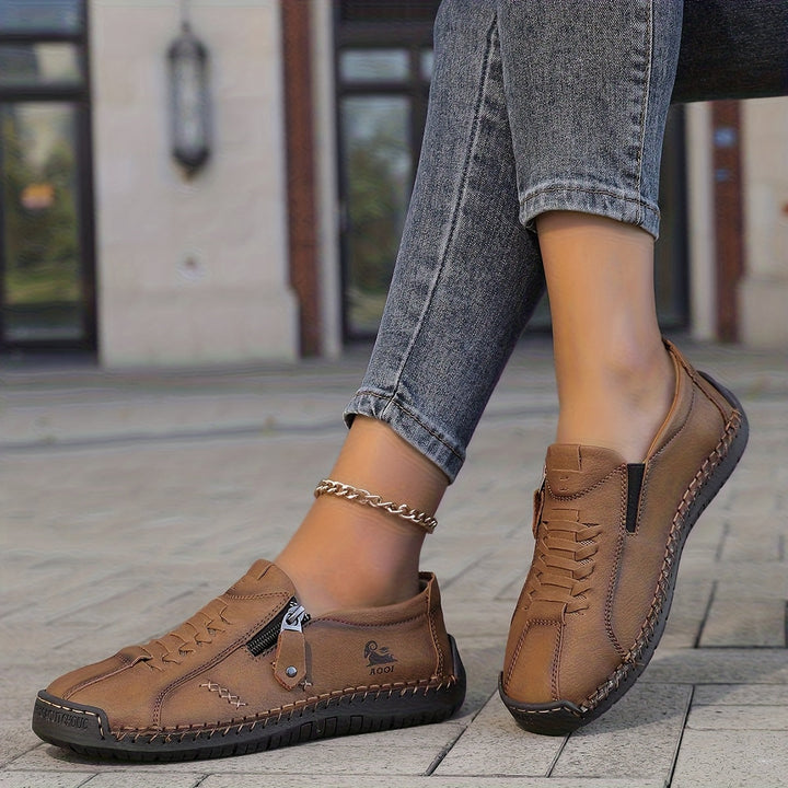 Nila – Elegante comfort met een praktische rits