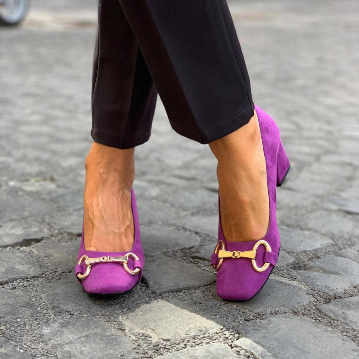 ELEGANTE DÉCOLLETÉ MET GOUDDETAIL