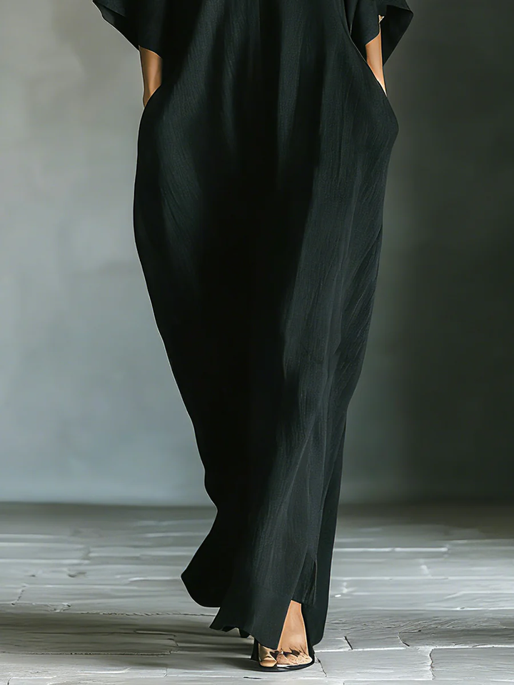 Alessandra™ | Lange zwarte oversized minimalistische jurk met kimono-mouwen