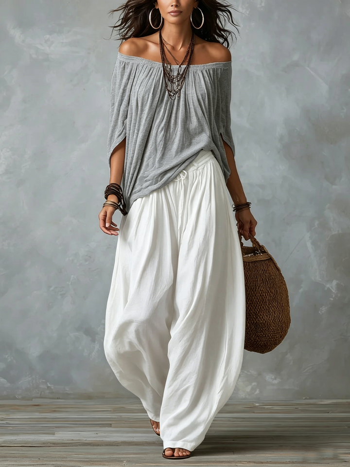 Grijze Off-shoulder Top En Witte Loszittende Lantaarnbroek Set