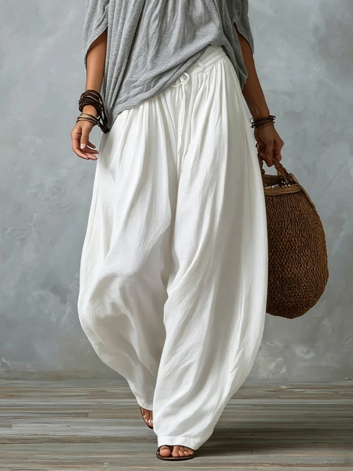Grijze Off-shoulder Top En Witte Loszittende Lantaarnbroek Set