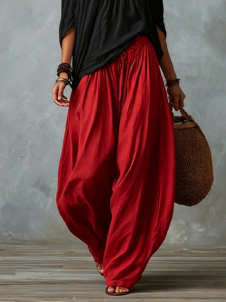 Zwarte Off-shoulder Top En Rode Loszittende Lantaarnbroek Set