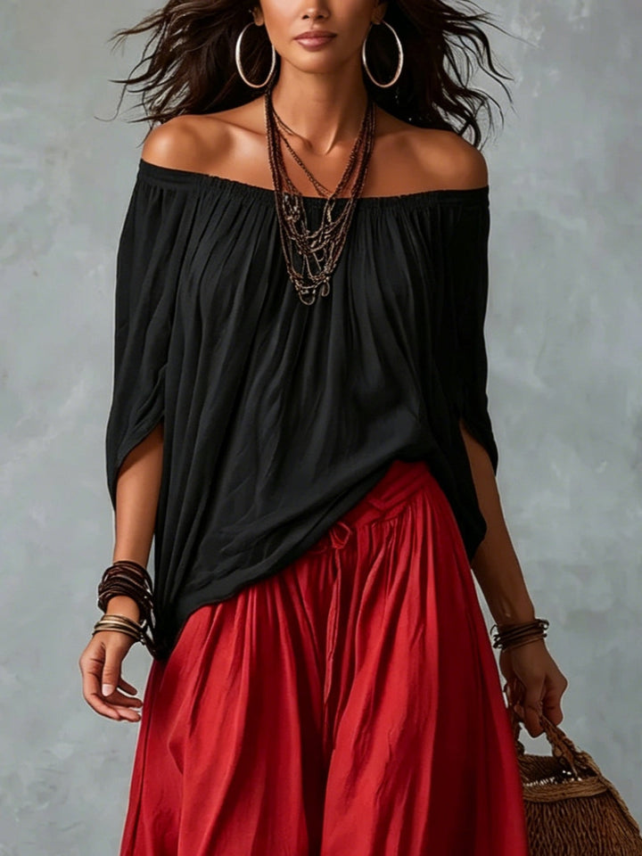 Zwarte Off-shoulder Top En Rode Loszittende Lantaarnbroek Set