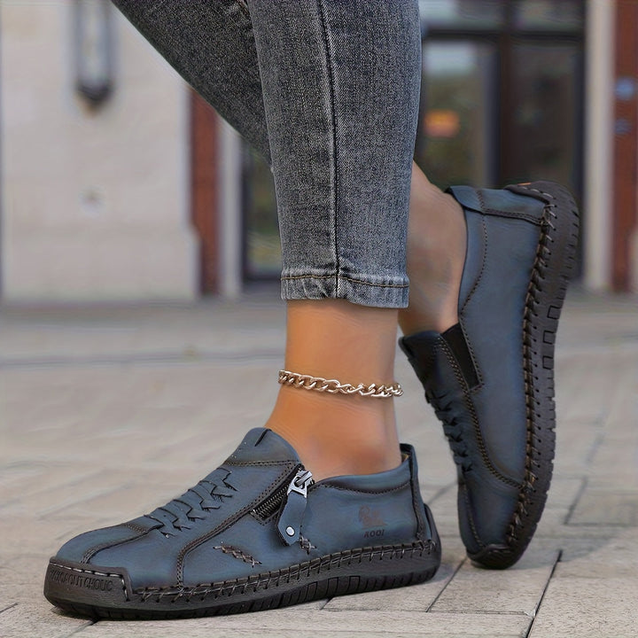 Nila – Elegante comfort met een praktische rits