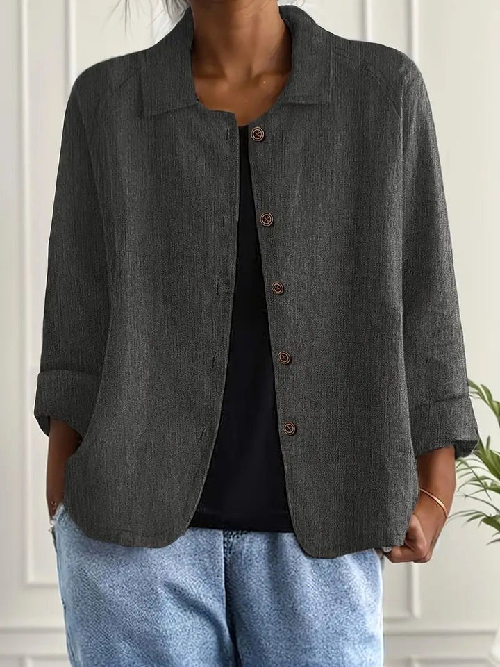 Ria | Soepel Vallende Blouse met Knoopsluiting