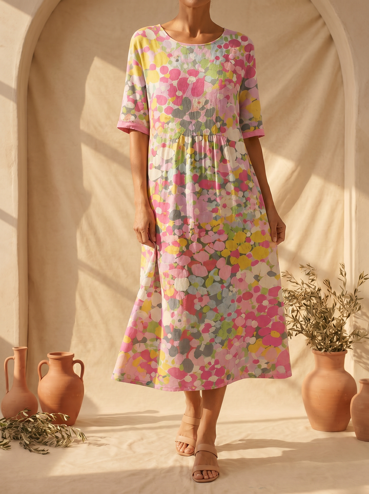 Leonor | Lichte en vloeiende midi-jurk met bloemenprint