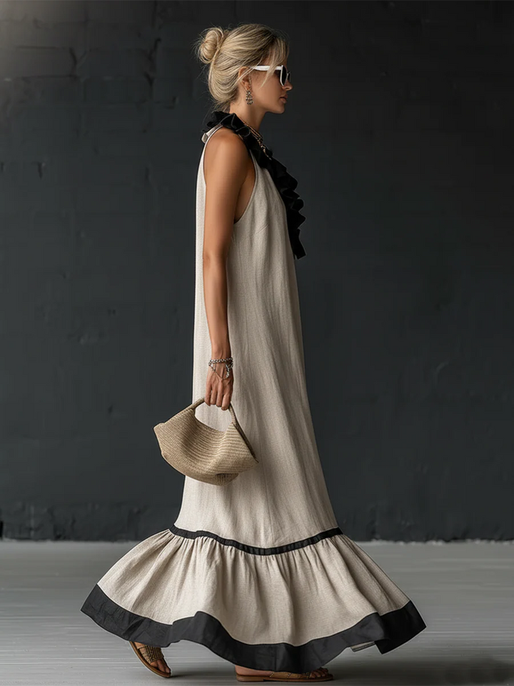 Elegante en romantische maxi-jurk met volant en kleurblokken