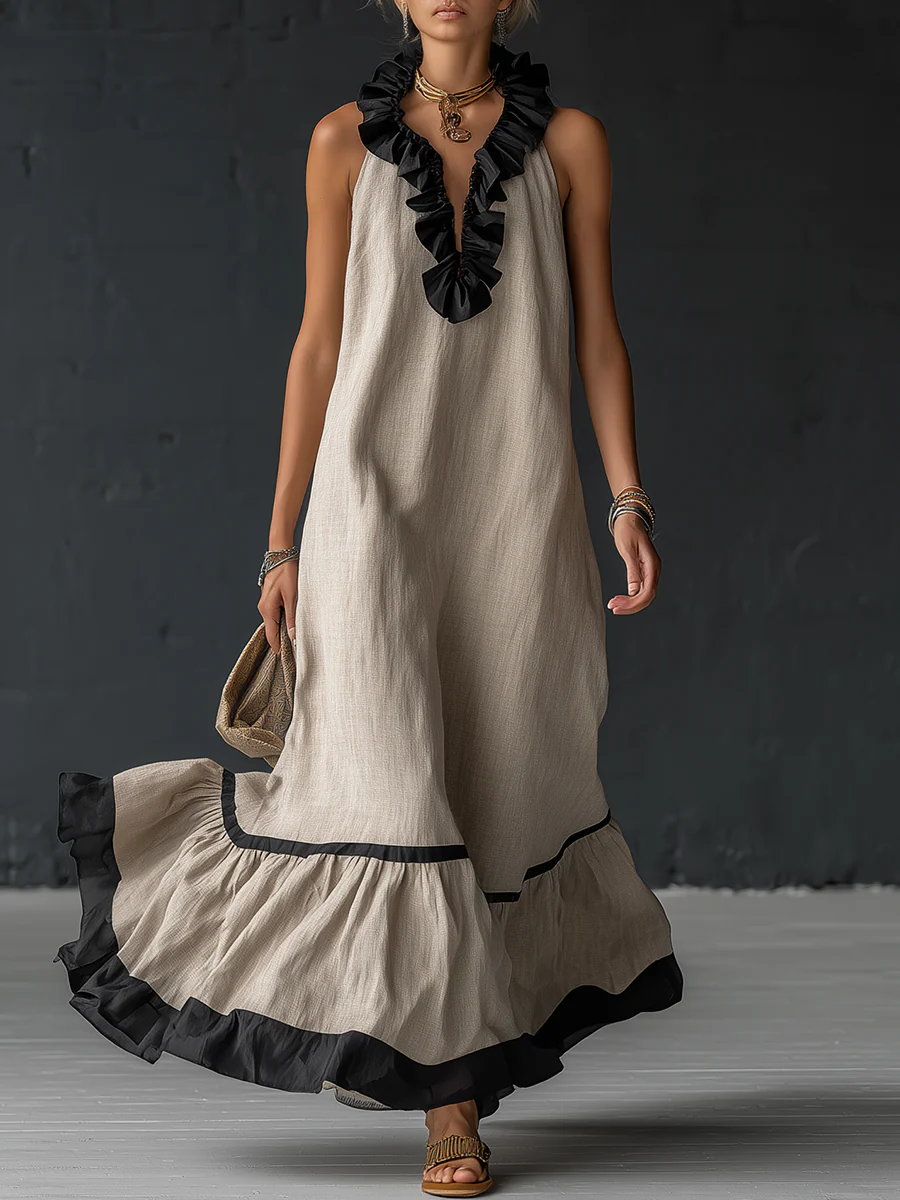 Elegante en romantische maxi-jurk met volant en kleurblokken