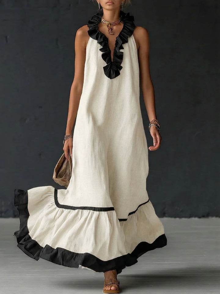 Elegante en romantische maxi-jurk met volant en kleurblokken