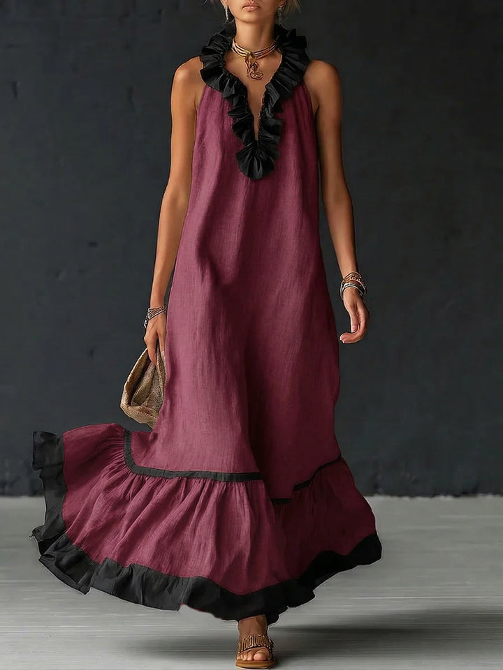 Elegante en romantische maxi-jurk met volant en kleurblokken