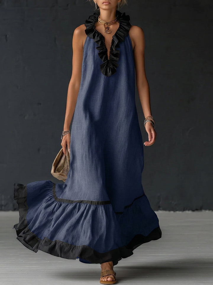 Elegante en romantische maxi-jurk met volant en kleurblokken