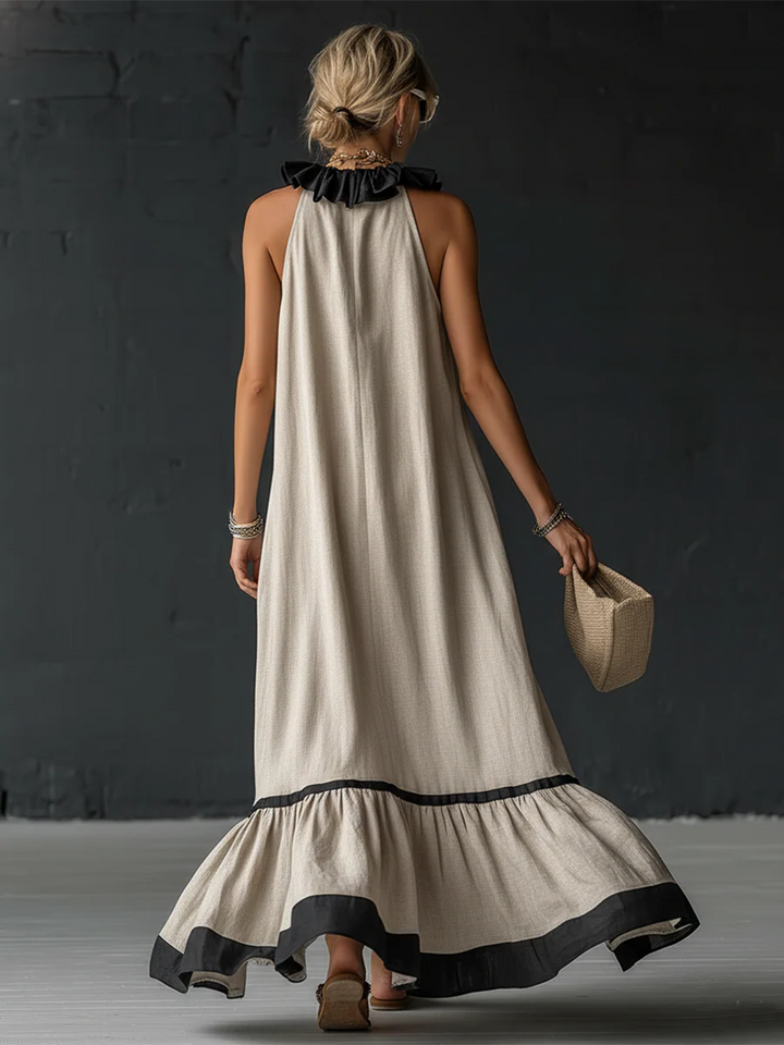 Elegante en romantische maxi-jurk met volant en kleurblokken